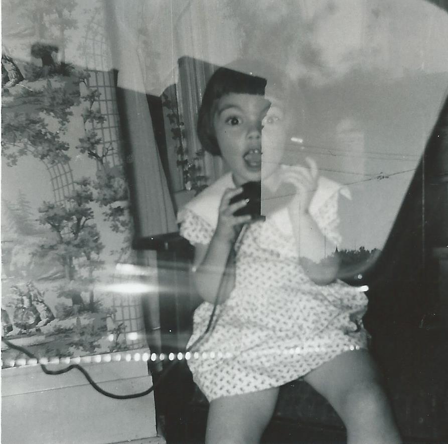 Marilyn talking on the telephone, 
              1955