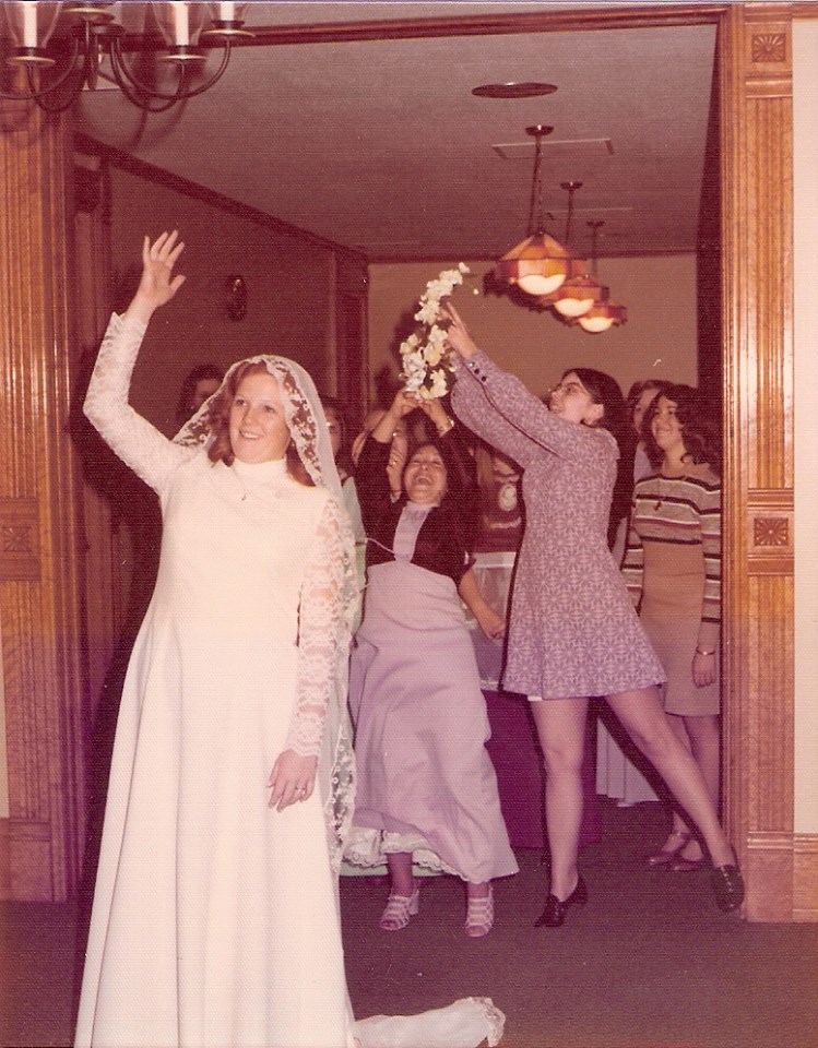 Marilyn catching the bouquet at the wedding of her second cousin Ruth Merillat