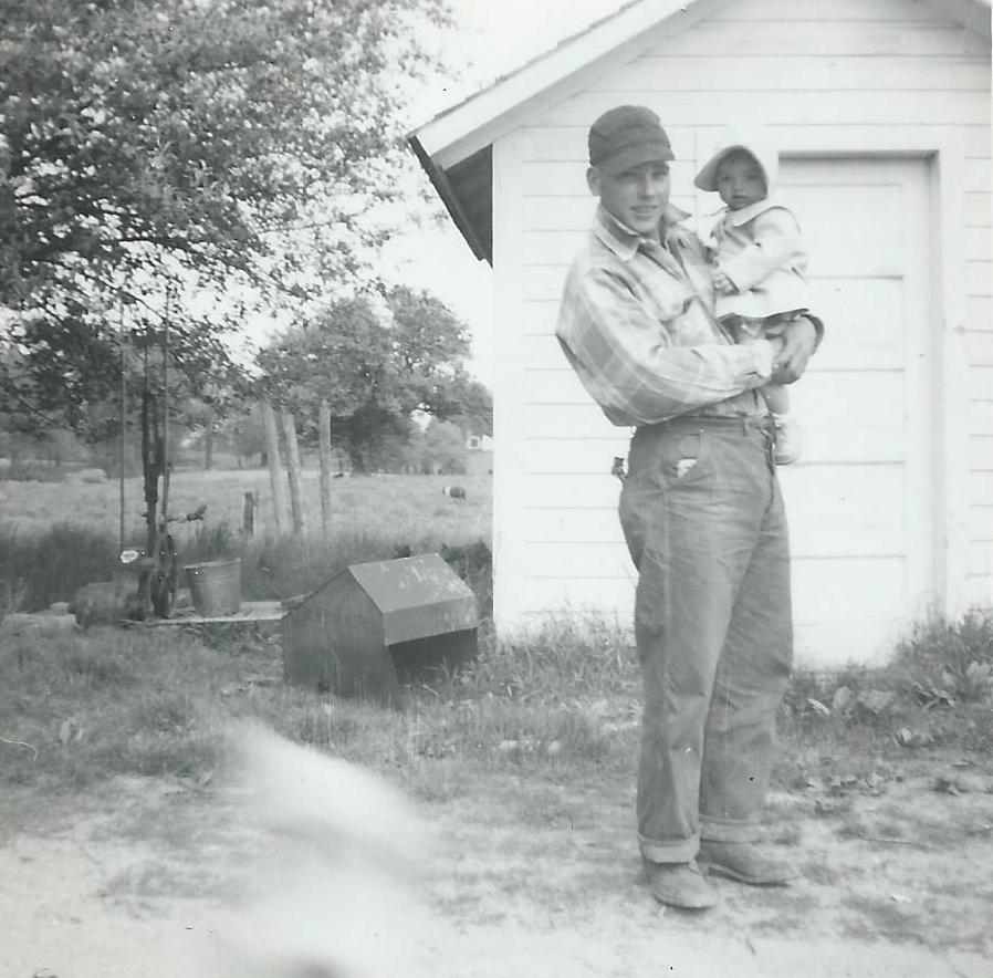Marilyn Munsell being held by Dallas J. Munsell