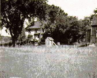 Barnard McNitt house as rediscovered in 1917; at right
is 1735 barn